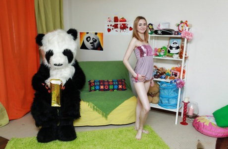 Lecherous teenage cutie has a hardcore sex with her panda toy