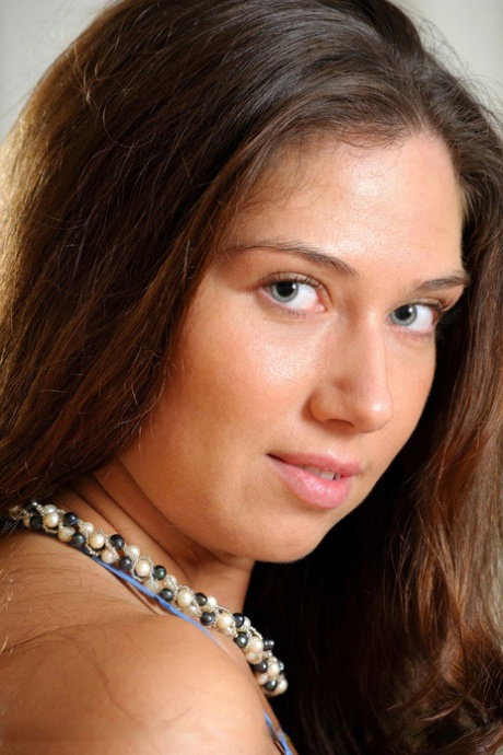 Russian girl Zhanna B sports a no panty upskirt before great nude poses