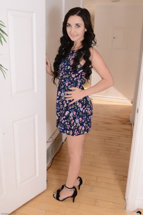 American teen Jade Amber strips in the hallway & shows her big ass & holes