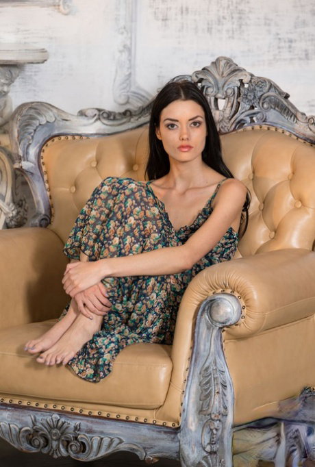 18 year old brunette Alma slips off her long dress for nude posing