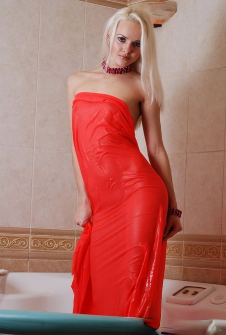 Hot blonde teen Vika T takes a bath in a provocative fashion