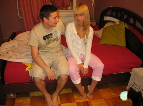 Blonde teen ends up on top during sexual intercourse upon a bed