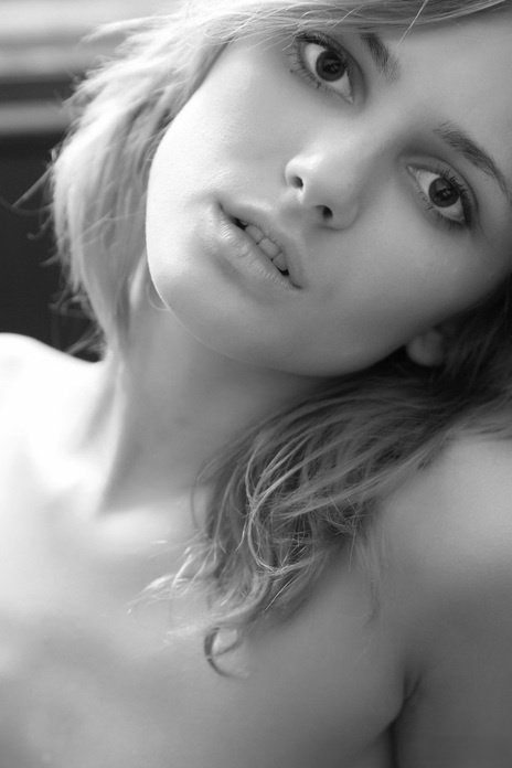 Blonde teen Erica hots upon tempting nude poses during a solo session
