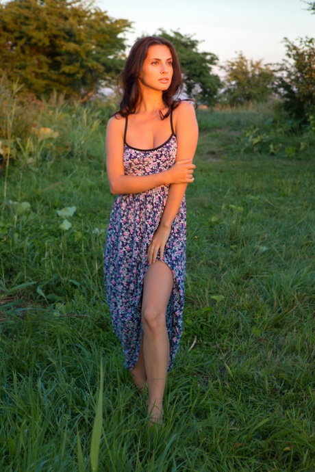 Young beauty Jasmine Jazz gets totally naked before entering a marsh