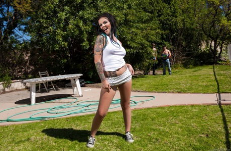 Tattooed fetish enthusiast taking filthy outdoor DP and cumshots