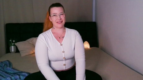 Chubby mom Sophia V shows her big ass and masturbates using sex toys on a bed