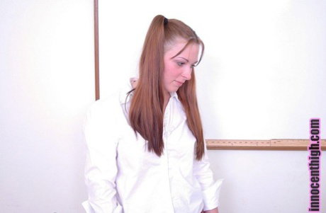 Schoolgirl Kylie Haze gives a blowjob to teacher Jordan Ashley who fucks hard
