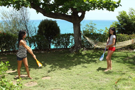 Young looking lesbians remove their shorts before engaging in lesbian sex