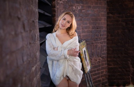 Young blonde Arya strikes great nude poses in over the knee sports socks