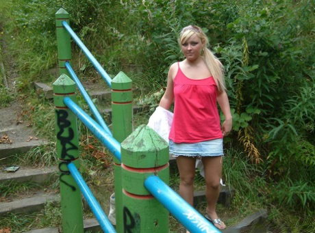Overweight UK female with blonde hair strips naked on a popular walking trails