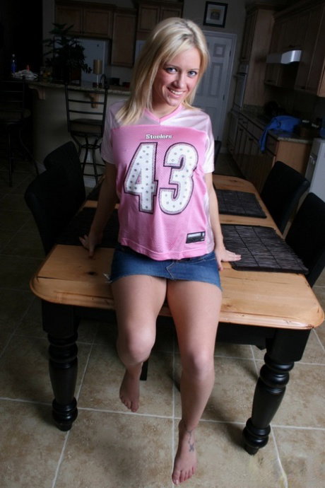 Blonde first timer Danielle Lynn does an ass grab after baring her boobies
