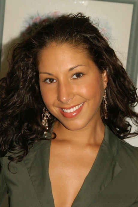 Charming Latina Tina revealing her slender tanned body and small boobs
