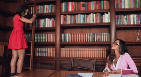 Petite teen Giselle Leon and big titted librarian Ariella Ferrera share a knob