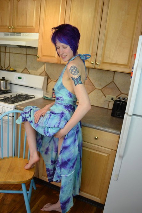 Blue haired chick with piercing Lila Night strips and touches her vagina