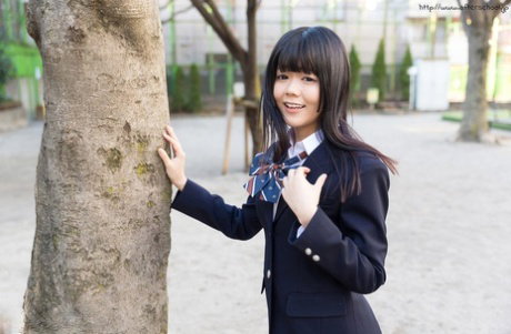 Horny Asian schoolgirl gets rid of her skirt and flaunts her ass and pussy
