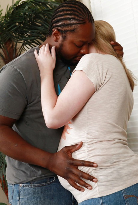 Chunky blonde amateur being force fed a thick black cock