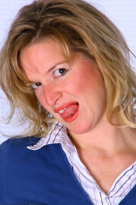 Blonde amateur shows her natural tits and full bush during solo action