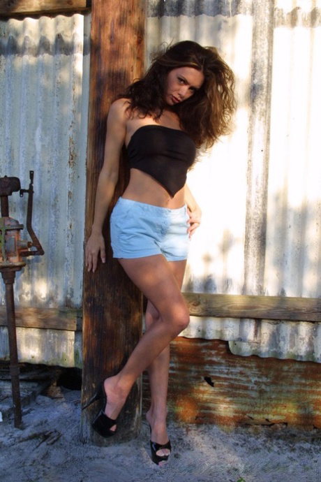 Big-boobed amateur hotties strip and lick each other's coochies outdoors