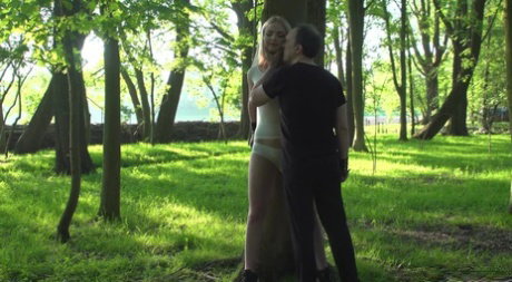 Petite teen Lolly Small gets spanked and toyed while rope bound in the woods
