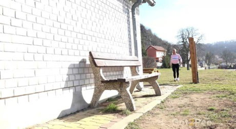 Solo girl Naomi Bennet pisses on a public bench in the middle of the day