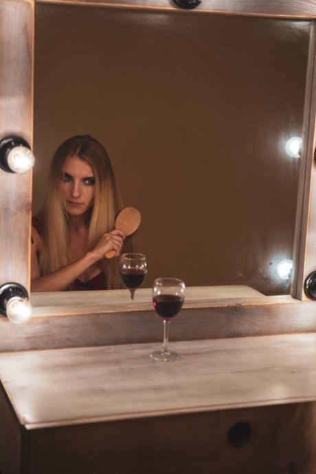 Petite Ukrainian Kerry Bradshow strips off her lingerie & brushes her hair