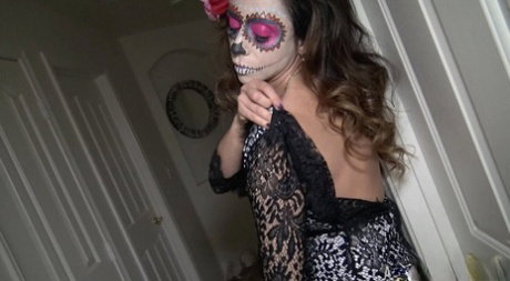 Colombian MILF with big tits Ariella Ferrera rubs her muff wearing face paint