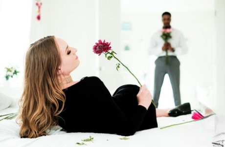 Pretty teen Daisy Stone is gifted flowers prior to interracial anal sex