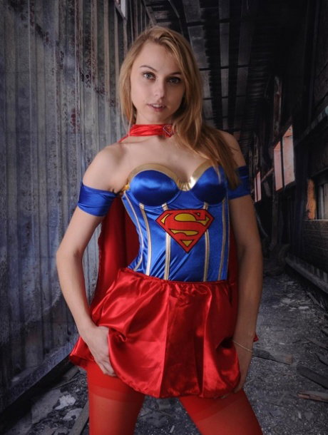 Beautiful amateur babe Chloe posing dressed as a Superwoman in a solo