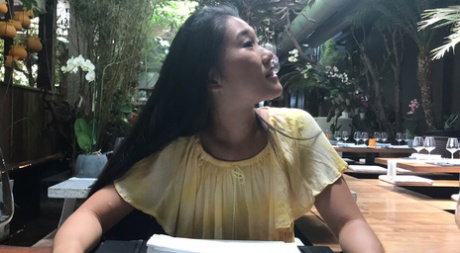 Sexy Asian babe Fang lifts up her yellow dress and takes a dick in a POV show