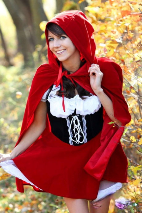 Sweet teen Andi Land frees her tits and twat from a Red Riding Hood outfit
