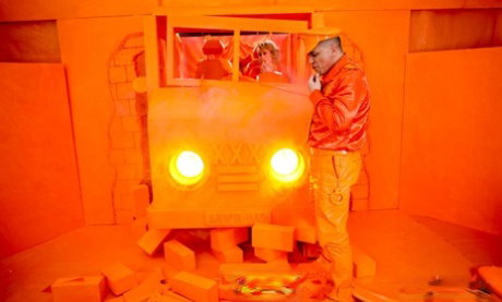 Blonde MILF Brittany Bardot takes a boner deeply in an all-orange environment
