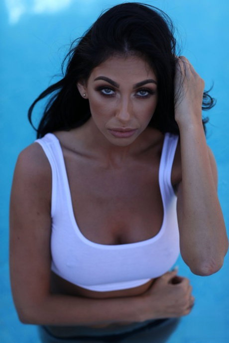 Gorgeous British model Anya Leigh gets wet and teases with her big breasts