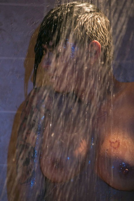 Stunning MILF with big breasts Eva Angelina showers and teases with her body