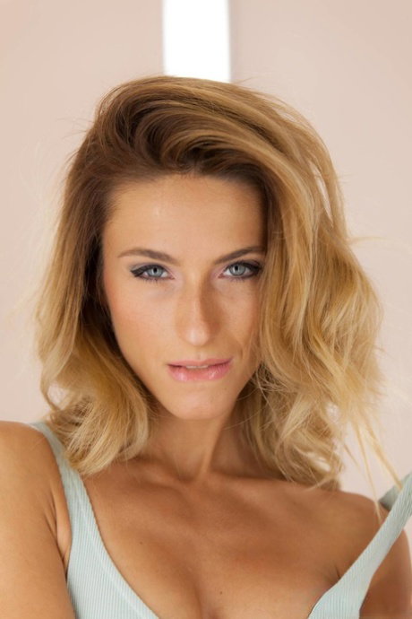Hot young girl Cara Mell masturbates while trying on clothes in a fitting room