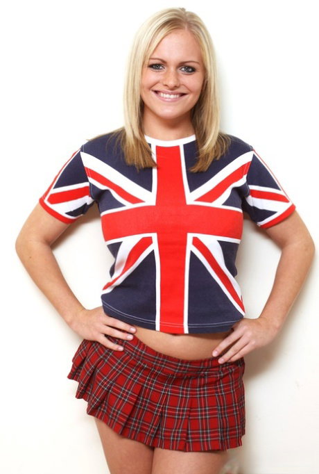 Blonde amateur Victoria Summers frees her big naturals from a Union Jack shirt