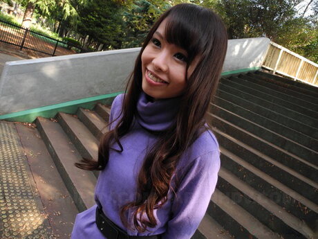 Japanese girl Eri Ouka gives a blowjob during a road trip in a minivan