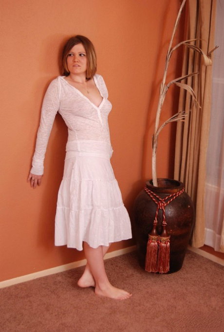 Amateur woman Summer looses her firm breasts from a white dress