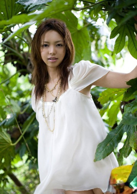 Japanese girl Yura Aikawa flashes upskirt panties during solo action