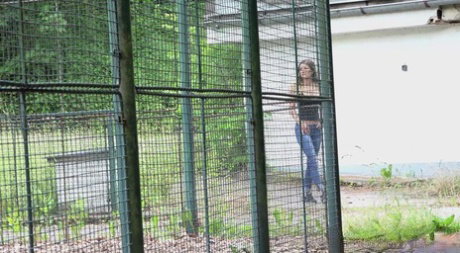 Sexy brunette Rebecca dropping jeans and white panties and pissing in public