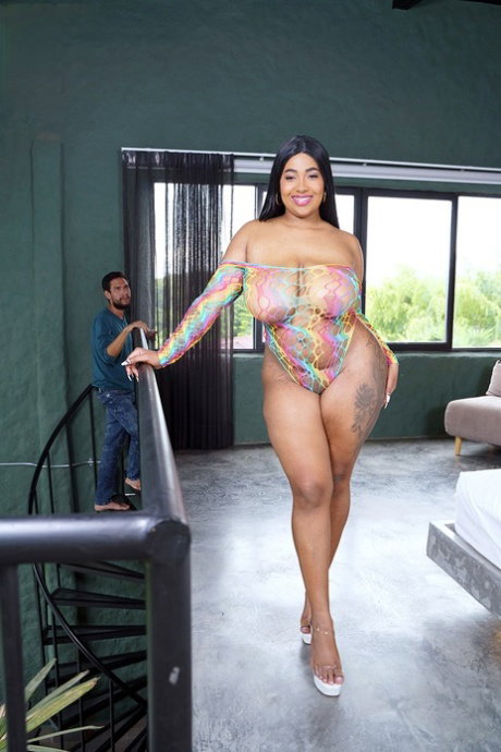 Big Latina chick Thayana models a revealing dress before fucking