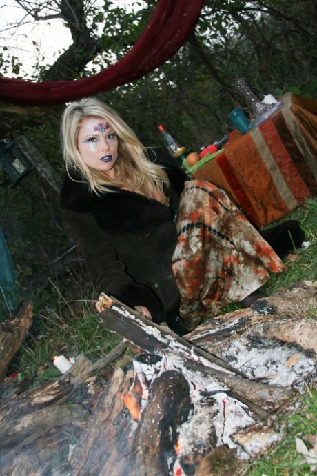 Blonde amateur Meet Madden models a bikini and OTK boots near the woods