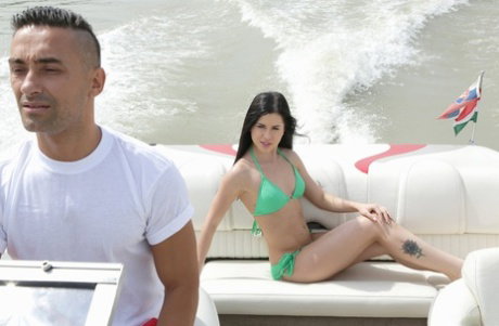 Dark haired chick Cassie Right goes ass to mouth on a speedboat