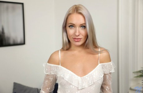 Solo model Angelika Grays pets her teen pussy after exposing her nice ass