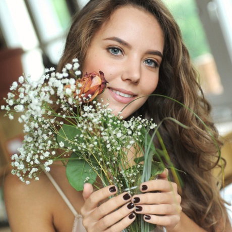 Beautiful girl Katya Clover poses totally naked on a kitchen counter