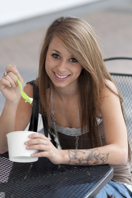 Sweet teen Rilee Jensen exposes her small tits in a public square