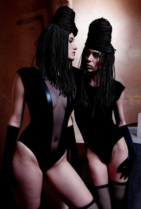 Cosplay lesbian pornstar Aiden Ashley and Kimberly Kane pose in long boots