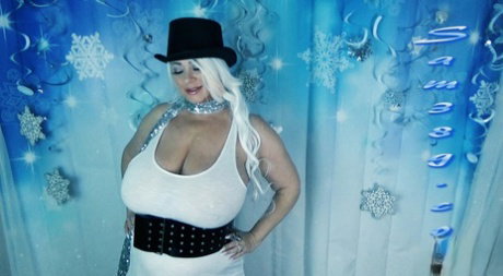Chubby pornstar Samantha 38G unleashes and licks her big boobs in a solo
