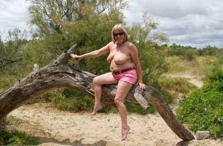 Fatty amateur mature slut Speedy Bee gets down and dirty in sand