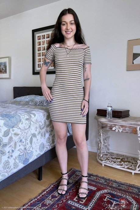 Brunette babe April Valentino displays & spreads her yummy pussy up close