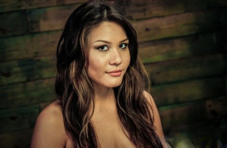 Asian girl Mena Li is subjected to humiliating sex acts during lezdom play